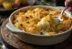 Tentação de Jansson com extra creme, servido com queijo e cebola dourada