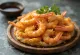 Ebi fry com shichimi togarashi, camarão crocante com limão e tempero shichimi togarashi