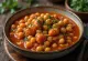 Estofado de grão-de-bico com tomate servido