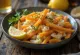 Bacalhau à Brás servido com batata doce e salsa