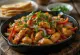 Fajitas de frango com legumes, servidas com coentro fresco